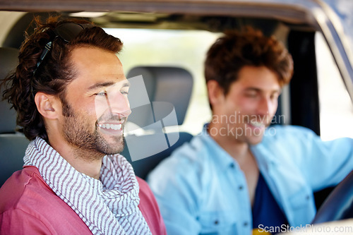 Image of Freedom,, driving and happy men friends in a car for road trip, adventure or vacation together. Travel, transportation and people laugh in a vehicle for holiday, trip or journey outdoor while bonding