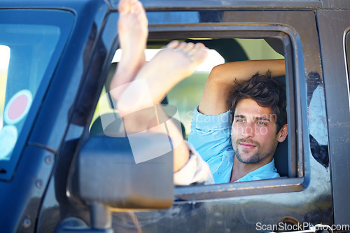 Image of Road trip, man or feet on window of transport for relax, peace and adventure with travel or destination. Person, tourist or traveler with chilling on vacation, holiday or traveling journey in nature