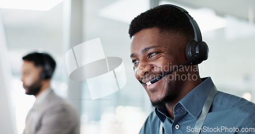 Image of Happy black man, call center and customer service in telemarketing, communication or support at office. African male person or consultant agent smile in online advice, help or contact us at workplace