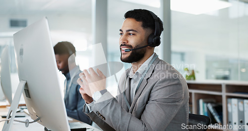 Image of Computer, call center and happy man talking, crm and support at help desk office. Technology, customer service and sales agent consulting, telemarketing communication or speaking to business contact