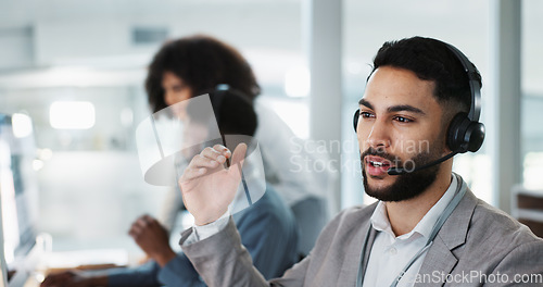 Image of Happy businessman, call center and customer service in telemarketing, communication or support at office. Friendly man, consultant or agent smile in online advice, help or contact us at workplace