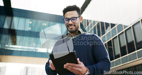 Image of Tablet, smile and businessman walking in the city doing research for a legal strategy. Happy, digital technology and professional male lawyer from Colombia working on case commuting in urban town.