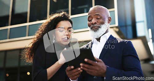 Image of Tablet, talking and businesswoman with manager in the city planning a legal strategy. Discussion, digital technology and team of professional lawyers working on case in collaboration in urban town.