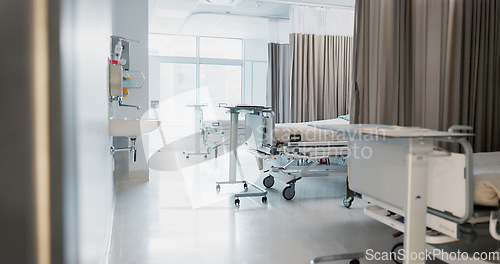 Image of Hospital, modern and interior of bedroom or empty room for healthcare, consulting or healing. Background, medical and clinic space for emergency, rehabilitation or recovery with furniture or light