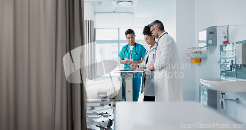 Image of Healthcare, hospital and a medical team of doctors checking on a patient in recovery or rehabilitation. Medicine, teamwork and consulting with a group of health professionals in a clinic for wellness