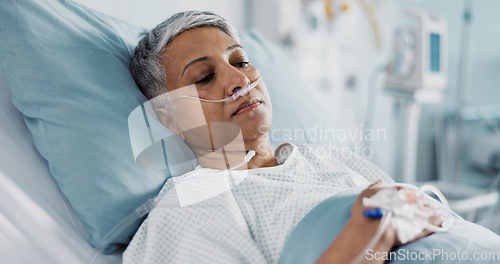 Image of Sick, iv drip and senior woman in the hospital for consultation, surgery or treatment. Healthcare, recovery and elderly female patient resting in bed after operation or procedure in a medical clinic.