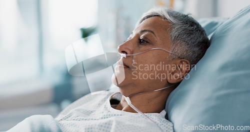 Image of Sick, iv drip and senior woman in the hospital for consultation, surgery or treatment. Healthcare, recovery and elderly female patient resting in bed after operation or procedure in a medical clinic.