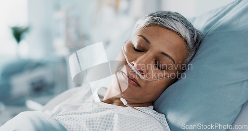 Image of Medical, iv drip and senior woman in the hospital for consultation, surgery or treatment. Healthcare, recovery and elderly female patient resting in bed after operation or procedure in a clinic.