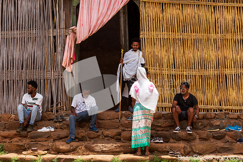 Image of Pilgrims and worshippers in front of the ancient monastery of Ura Kidane Mihret. Ethiopia