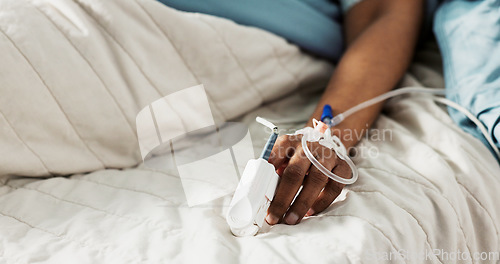 Image of Iv drip, emergency and hand of patient in a hospital after surgery, treatment and operation in a clinic sleeping. Closeup, healthcare and person in medical ER for recovery, life support and medicine