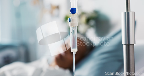 Image of Iv drip, patient and medicine in hospital for healthcare, nutrition or water in bed with healing. Medical, liquid and person with health support or solution for emergency, wellness or rehabilitation