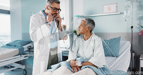 Image of Healthcare, doctor and patient breathing with stethoscope for diagnosis, medical service and checkup. Hospital, clinic and health worker with mature person for surgery recovery, wellness and healing