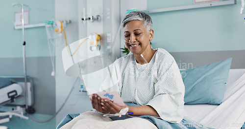 Image of Woman in hospital with get well soon card with good news with ventilation tube for oxygen, medical service and care. Healthcare, happy and mature person smile for surgery recovery, wellness and resul