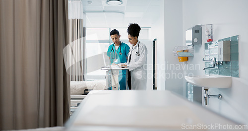 Image of Doctor, team and nurse in discussion on tablet, planning and communication in hospital with bag. Technology, medical professional workers and people research healthcare online, wellness or telehealth