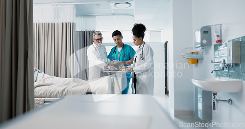 Image of Healthcare, hospital and a medical team of doctors checking on a patient in recovery or rehabilitation. Medicine, teamwork and consulting with a group of health professionals in a clinic for wellness