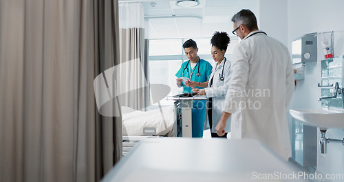 Image of Healthcare, hospital and a medical team of doctors checking on a patient in recovery or rehabilitation. Medicine, teamwork and consulting with a group of health professionals in a clinic for wellness