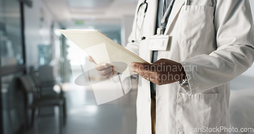 Image of Hands, medical folder and doctor with results, person in hospital with signature, surgeon and healthcare document. Reading health report, sign off with paperwork and medicine, check info and chart