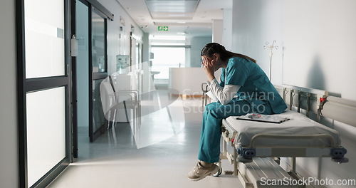 Image of Fail, crying or doctor with stress in hospital unhappy with healthcare results or medical problem. Depression, mistake or sad woman nurse frustrated by grief, death or loss in clinic with headache