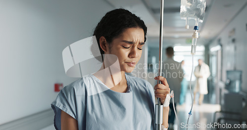 Image of Sad, breathing and a woman with an iv drip at hospital for medicine, wellness and recovery from virus. Depression, thinking and a clinic patient with treatment stress, burnout or anxiety while sick