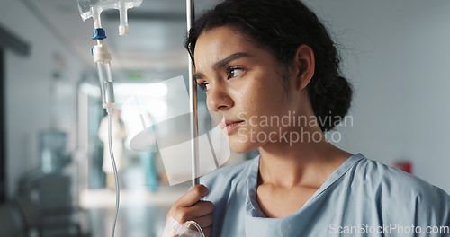 Image of Woman, patient and iv drip, healthcare at hospital for wellness, burnout and medicare treatment. Female patient, hospital and recovery from virus or cancer, stress and depression while sick in pain