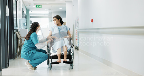 Image of Doctor, wheelchair patient and talking people consulting over healthcare service, wellness surgery or medical support. Clinic, help and medical expert, nurse or surgeon chat to person with disability