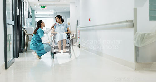 Image of Doctor, wheelchair patient and talking people consulting over healthcare service, wellness surgery or medical support. Clinic, help and medical expert, nurse or surgeon chat to person with disability