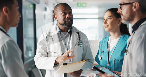 Image of Doctors, nurses and team planning, hospital management and workflow discussion for schedule, advice or services. Healthcare worker, mentor and people with medical documents, clinic files and meeting