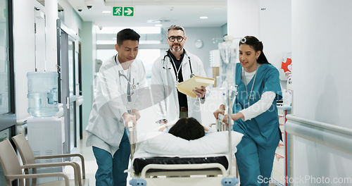 Image of Doctors, people talking and push patient hospital bed, consulting and feedback on medicine treatment, support or ICU surgery. Teamwork, conversation and walking team, nurses or surgeon helping client
