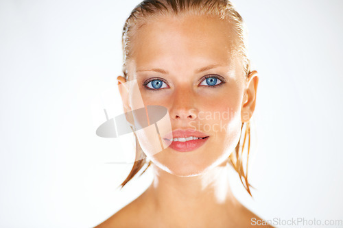 Image of Shower, beauty and portrait of woman on a white background for wellness, grooming and cosmetics. Dermatology, luxury spa and face of person with wet hair for skincare, washing and cleaning in studio