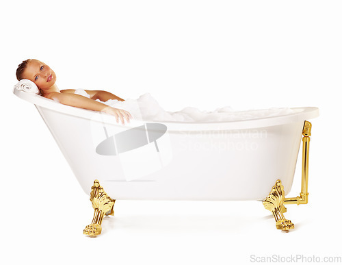 Image of Portrait, bath tub and studio woman cleaning, grooming or washing for relax body care, hygiene or spa skincare treatment. Bathroom bubbles, soap foam and salon person wellness on white background