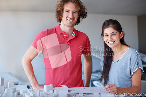 Image of Architecture model, professional portrait and happy people planning development, project or buildings design. Partner teamwork, engineering or architect on property, construction or infrastructure