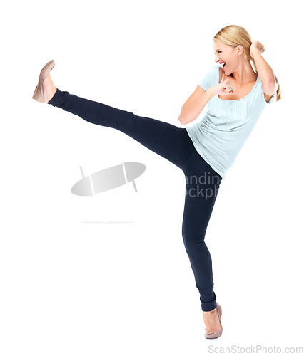 Image of Woman, fight and kick a leg in air with karate, action or movement on white background in studio. Foot, kicking and person in self defence training, class or fighter with energy for attack move