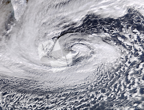 Image of Hurricane, cyclone or weather pattern for warning of natural disaster or destruction from mother nature. Earth, sky and cloud formation of a storm in winter from a satellite to view a tornado