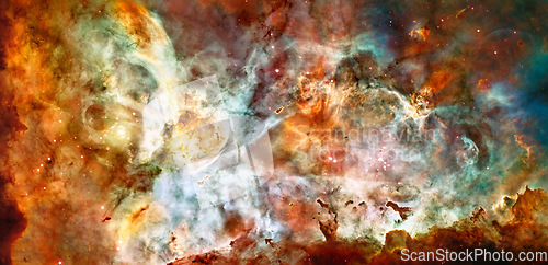 Image of Cosmos, space and nebula dust in milky way with stars, gold light and color, glow or pattern on galaxy background. Cloud, sky and universe, aerospace or solar system for science or planets wallpaper