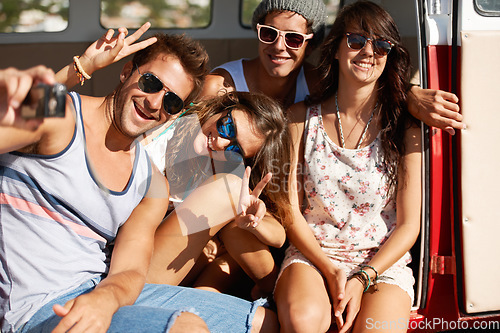 Image of Photography, travel or friends taking selfie on road trip for a fun summer holiday vacation together. Smile, camera or group of happy people take pictures on an adventure for memory or freedom in van