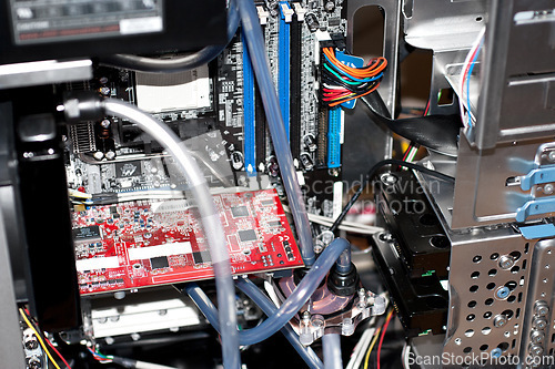 Image of Closeup, computer hardware and cables with motherboard, RAM technology and data innovation of engineering. Background, electrical pc and maintenance of circuit board, cpu memory or upgrade GPU system