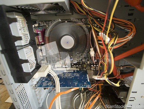 Image of Closeup, computer hardware and cooling system with motherboard, RAM technology or data innovation of engineering. Background, pc cooler fan and maintenance of circuit board, cpu memory or upgrade GPU