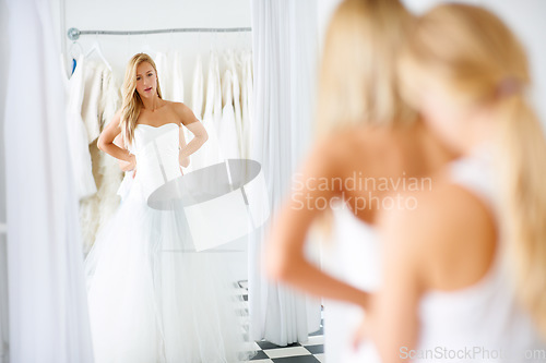 Image of Wedding, mirror and young bride in dress in boutique, shop or store in mall for fitting. Retail, romance and female person from Canada preparing for marriage ceremony, party or reception for love.