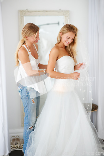 Image of Wedding, fitting and bride with girl friend in a luxury boutique, shop or store mall. Retail, fashion and female person from Canada preparing for marriage ceremony, shopping or reception for love.