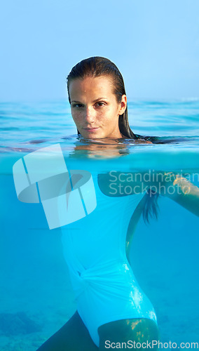 Image of Woman, portrait and ocean swimming for travel, holiday and sea water on a tropical island. Hawaii, outdoor and female person relax on a summer vacation with freedom and adventure by beach in paradise