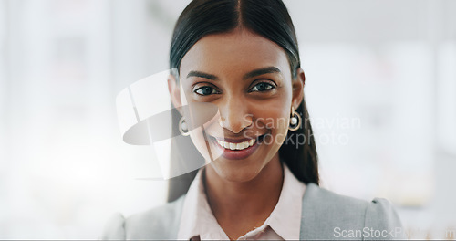 Image of Business woman, portrait and smile on face in an office with confidence and career pride. Professional entrepreneur person from India at corporate company with positive attitude and happiness