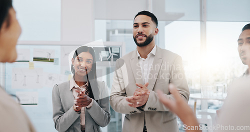 Image of Happy businessman, handshake and applause in promotion, b2b or team agreement at office. Business people shaking hands and clapping in greeting, introduction or partnership for deal at workplace