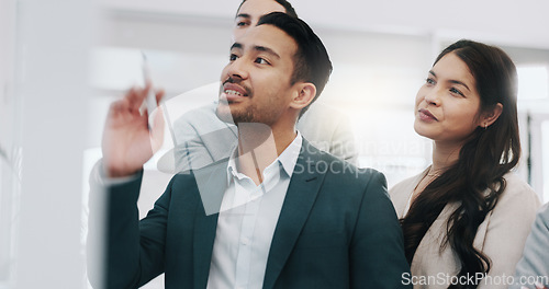 Image of Businessman, coaching and presentation in team brainstorming, strategy or schedule planning at office. Business people or mentor talking to group in staff training, project plan or tasks at workplace