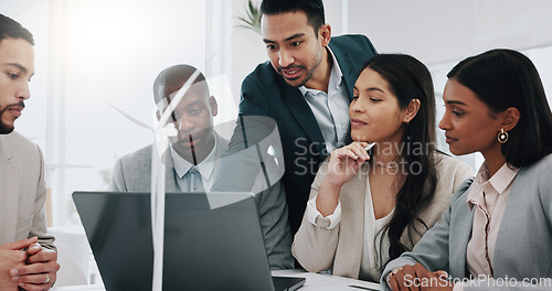 Image of Wind turbine, computer and man in office team working on clean energy and sustainability planning. Engineering, construction project and architect job with eco friendly and biodiversity design