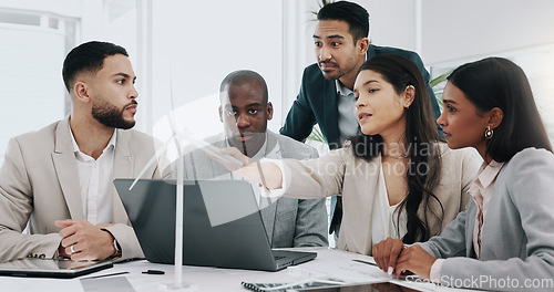 Image of Wind turbine, computer and man in office team working on clean energy and sustainability planning. Engineering, construction project and architect job with eco friendly and biodiversity design