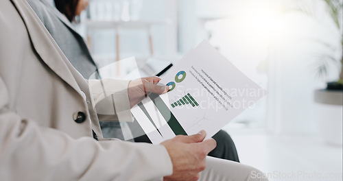 Image of Hands, document and data for a meeting or report on company growth, economy or financial wealth. Closeup, paperwork and a person with stats, finance review or reading information about business