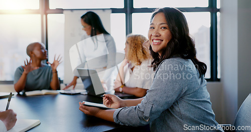 Image of Business meeting, portrait and woman writing with team for planning, strategy and marketing idea in office. Design, collaboration and face of designer with notes for group project, vision and mission