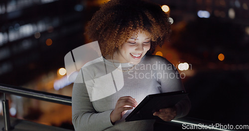 Image of Tablet, city balcony and laughing woman reading funny social network feedback, customer experience or website. Brand monitoring data, night review or African media worker doing online survey analysis