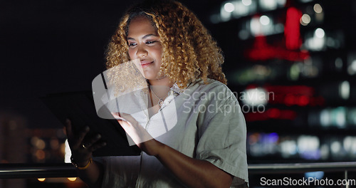 Image of Tablet, dark night balcony and black woman typing review of social network feedback, customer experience or ecommerce. Brand monitoring data, website or media worker working on online survey analysis