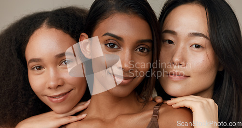 Image of Women, face and natural beauty, diversity and wellness, dermatology and friends isolated on studio background. Unique skin, cosmetic care and inclusion with skincare, smile and antiaging treatment